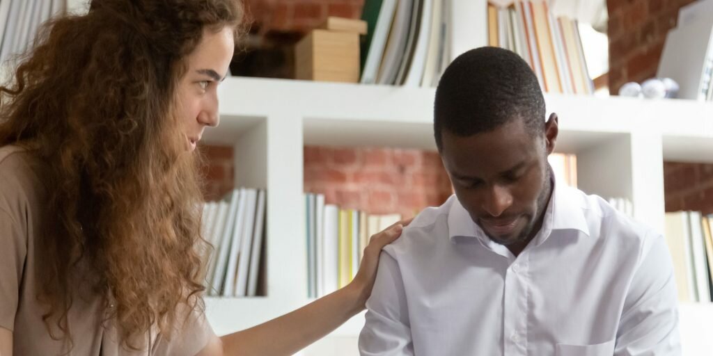 A man being treated by a woman at a dual diagnosis treatment center