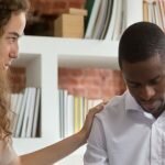 A man being treated by a woman at a dual diagnosis treatment center